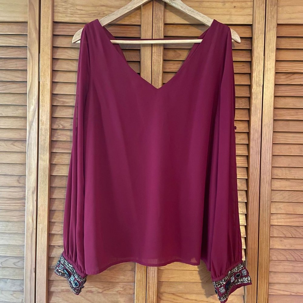 Buttons Brand long sleeve embellished top